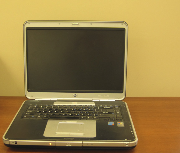Phtoo of a portable computer, on a table